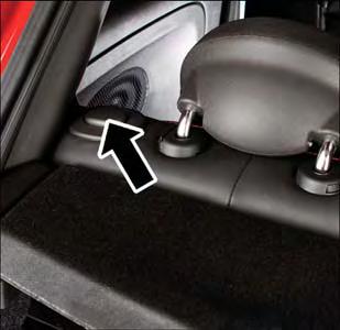 Lift the seatback upright and push the seat rearward to its locked position once the rear passengers are seated.