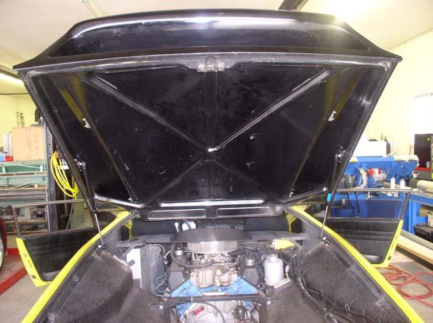 12) Brace the Deck Lid open using a 2x4 or pole capable of supporting the Deck Lid weight.