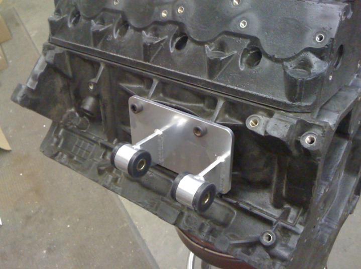 transmission crossmember bracket to your crossmember using the same bolts that held your factory bracket to the