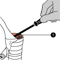 Pull the pumping element (3) complete with top washer (4), rebound spring (5) and bottom washer (6) off the top of the fork.