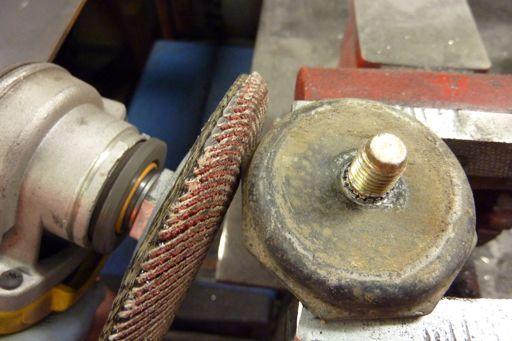 Step 109 Clamp the bump stop in a vice and grind