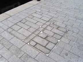 The major requirement for this prestigious public realm development was for the manhole covers to fit in seamlessly with the surrounding stone paving