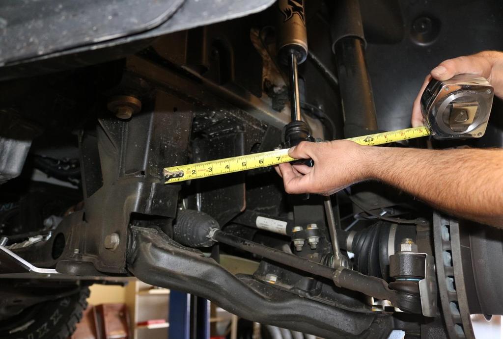 Measure from the center of the lower hole on the sub frame to the outer edge of the