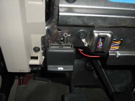 3. Apply the Black Ground Wire from the Main Harness to the Vehicle Ground Point behind lower dash panel. Figure 14 4.