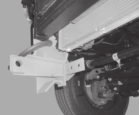 3. Install pushplate by holding front portion of pushplate in place and securing with the previously removed bumper bracket bolt assembly.