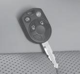 Integrated key fobs (2) with Remote Keyless Entry System replace the standard key and separate Remote Keyless Entry fob combination with a single integrated key fob.