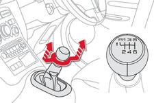 Releasing Pull the parking brake lever gently, press the release button then lower the lever fully.