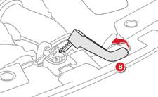 The location of the interior bonnet release lever prevents opening of the bonnet while the front left door is closed. F Push the exterior safety catch B to the left and raise the bonnet.