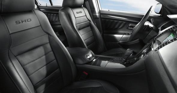 SHO Charcoal Black leather-trimmed seats with Charcoal Black perforated inserts and embroidered SHO graphics on front seats. Heated rear-seat controls, included in Equipment Group 40A. SHO 3.