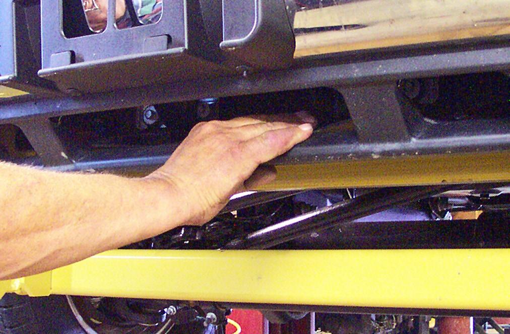 898 Carefully lift the bumper into position on the truck and reattach using original fasteners.