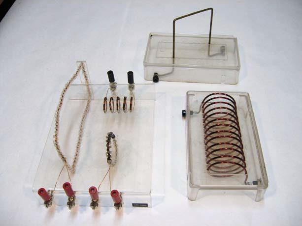 E6-03 MAGNETIC FIELD AROUND A WIRE AND SOLENOIDS [DSC# 5H15.10] Overhead projector or Elmo projector Field sources (assortment) Iron fillings Large DC power supply and leads.
