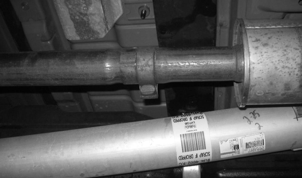 Remove the two bolts that secure the intermediate pipe and resonator to the catalyst pipe.