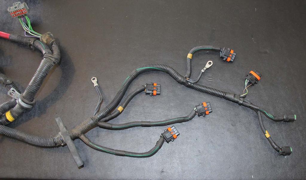 Here is an original Volvo 5 Cylinder Coil Harness with Two Cam VVT Plugs.