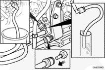 Install a quick-disconnect block-off fitting, Part Number 4918464, into the fuel drain line to prevent fuel flow into the fuel return manifold.