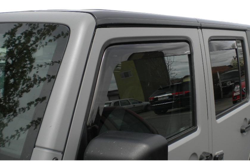 Smoked colored 2007 2014 82210277 0,2 Side ir Deflector ir Deflectors feature a wraparound style that creates an air stream away from your side windows.