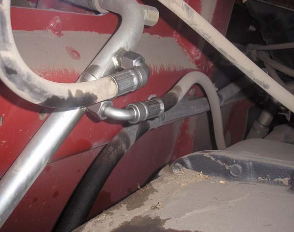 Hydraulic Hose Connection Procedures Tank Hose Connection 1. Identify the Tank/Return line on the tractor.