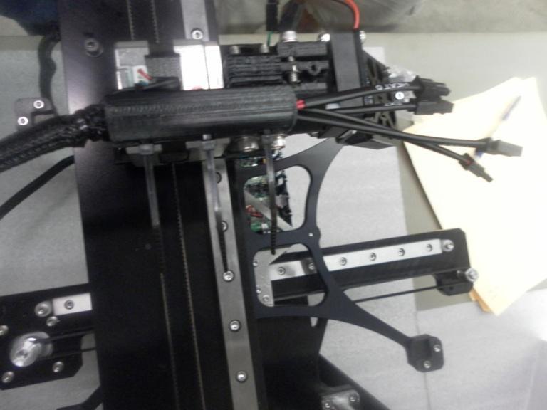 The following shows the Printed Extruder Motor Mount with Cover attached with cable