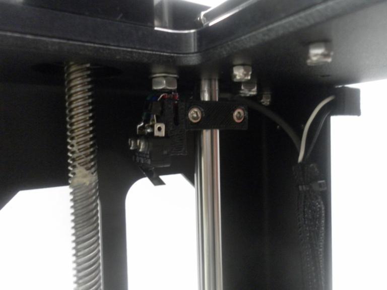 The Z End Stop is attached to the rear 10mm rod as shown below.