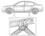 Vehicle Care 9-75 4. Position the jack head, as shown Set the jack to the necessary height before positioning it below the jacking point. 5. Attach the jack handle.