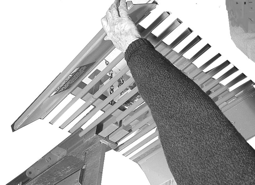 Table Grate Installation (Optional) The following procedure is for the installation of the optional Table Grate (Figure 11) on the DR 20-Ton WOOD SPLITTER.