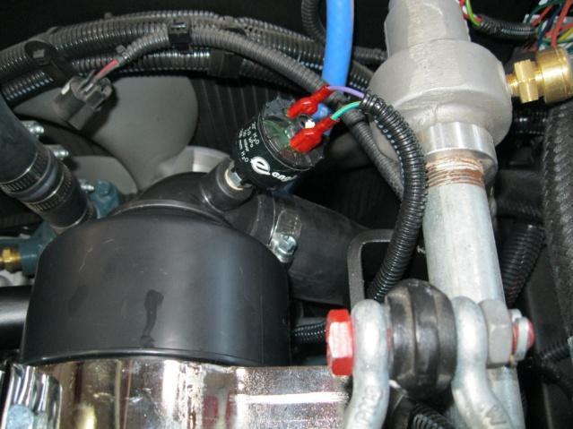 Connect the other end of the engine air intake hose to the new engine air filter, align for best clearance and tighten both end hose clamps.