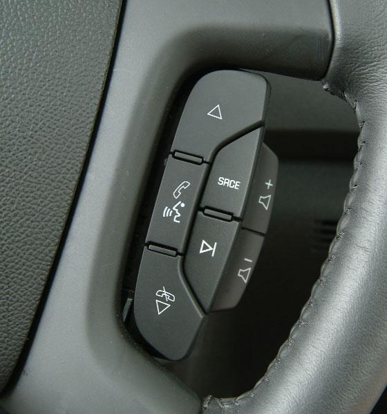 Audio Steering Wheel Controls (optional) + Volume Pull up the + or button to increase or decrease the volume.