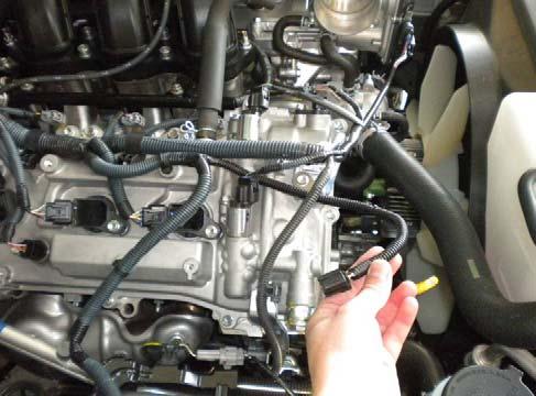 3-1 (b) Install 2 tree mount wire ties in the M8 bolt holes on top of the passenger side valve cover (Fig. 3-2).