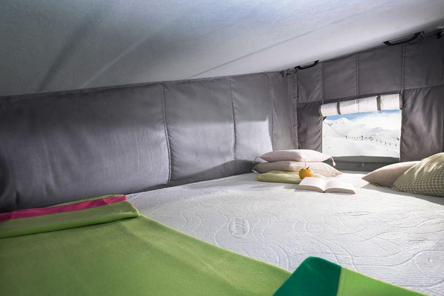 The roof insulation makes the pop-top roof a winter-proof sleeping and play