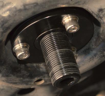 Adjuster Ring Lock Nut a) Disassemble the rear coilover bottom adjusters. The assembly is shown in Figure 8a.