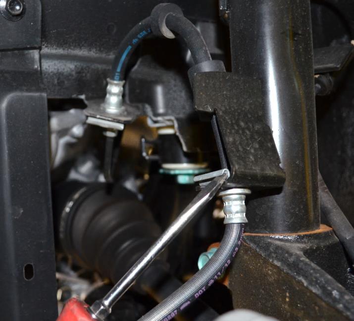 Alternately, use an automotive lift to gain access to the underside of the vehicle. Redundant support mechanisms are recommended.