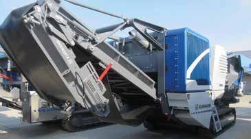 The side discharge conveyor, which is available in two lengths, remains attached to the machine during transportation and is put into position in an instant.