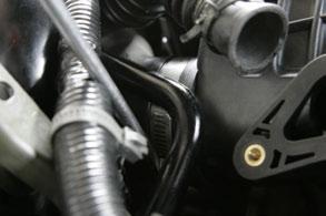 Remove the hose clamp on the intake manifold side of the