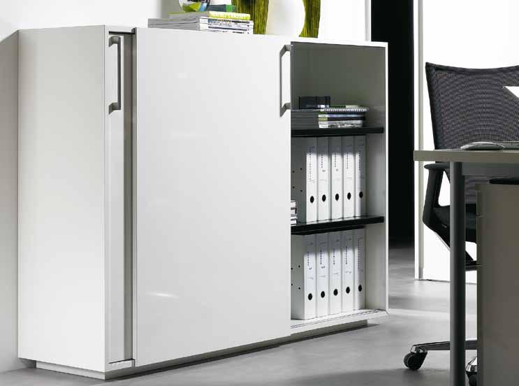Sliding doors are the perfect solution for office furniture: They don't take up any space, don't get in the way and provide unobstructed access to everything inside the cabinet.