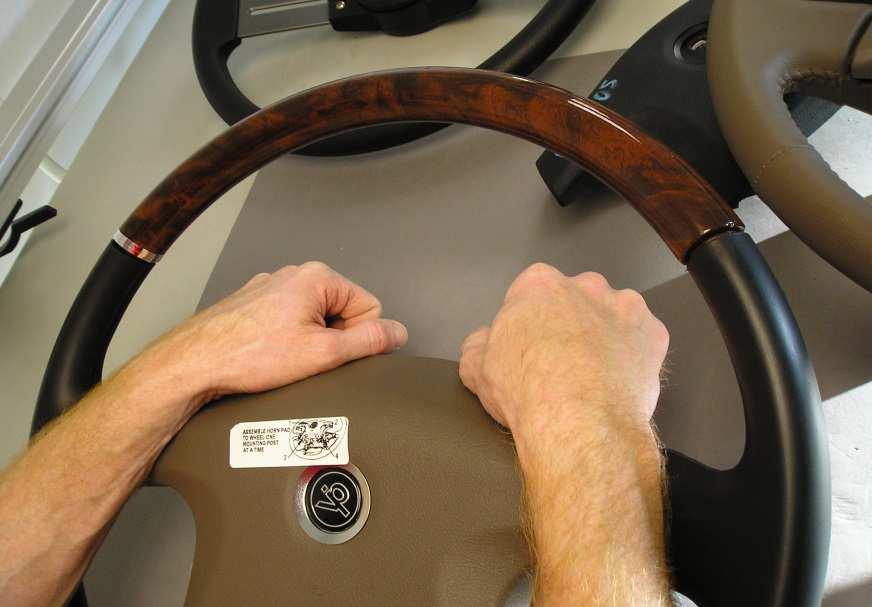 Directions for Removing Horn Pad: 1. Remove Horn Pad by placing both hands on top of pad as shown below (Pic 1).