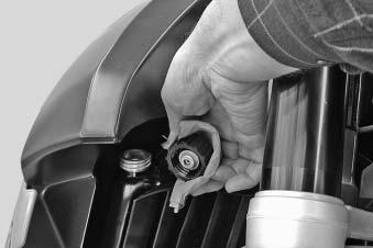 MAINTENANCE WORK ON CHASSIS AND ENGINE» 1 Checking the cooling liquid level in the radiator Hold the radiator cap [1] with a cloth, carefully turn in a counterclockwise direction and remove.