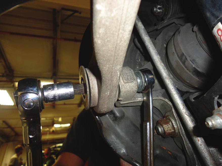 7. LOOSEN AND REMOVE THE REAR CONTROL ARM