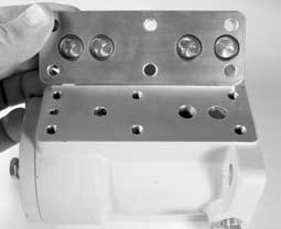 Maintenance Reassembling Step 3 - Replace the Valve Plate The valve body is symmetrical with respect to the