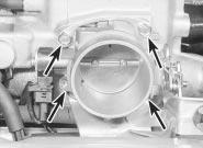 roll-over/anti-trickle-fill valve assembly but, instead of venting to atmosphere, a further tube runs the length of the vehicle to a carbon canister in the front right-hand corner of the engine