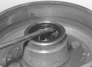 Do not allow the cups to tilt in the bore, or the surfaces may become burred and prevent the new bearings from seating correctly as they are fitted.