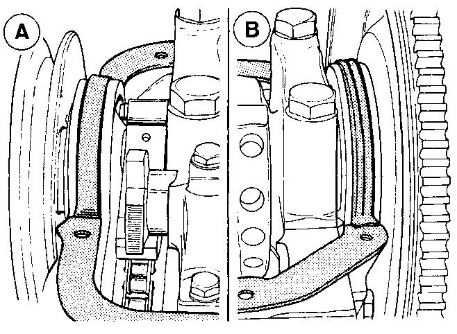 carrier. The lugs of the cork gasket halves fit under the cut-outs in the rubber gaskets (see illustration).