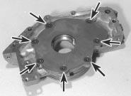 The key must be located with its flat edge parallel with the line of the crankshaft, to ensure that the crankshaft sprocket slides fully into position as it is being refitted.