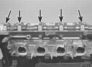 17 On reassembly, liberally oil the cylinder head hydraulic tappet bores and the tappets (see illustration).