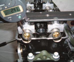 If your engine has separate inlet and exhaust cams then position clock gauge on the exhaust follower and set this to its specified lift (e.g. 2.41mm fig c).