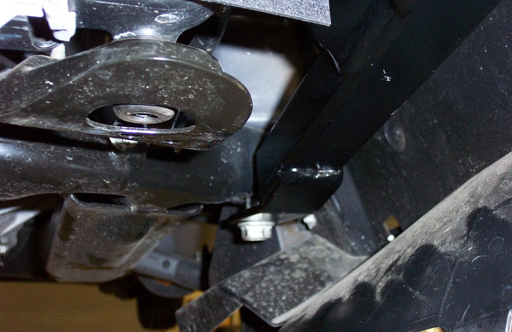 Bolt through the rear mounting points with the subframe bolts (Fig.L). Note: use thread lock on the bolts.