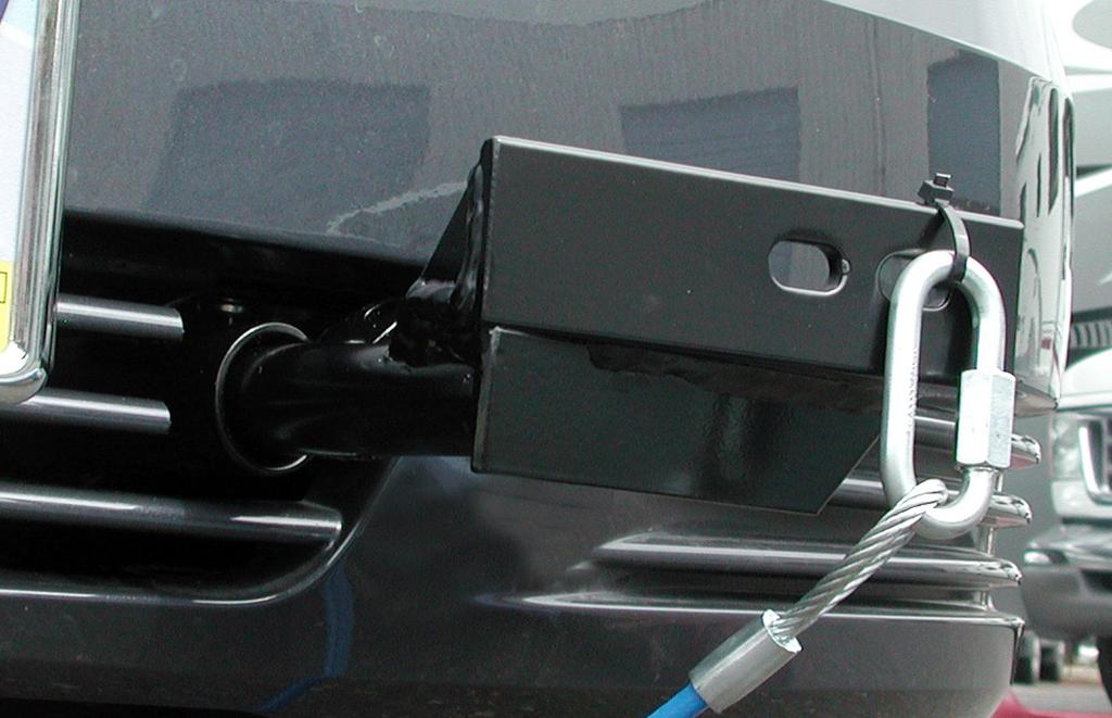 Note: on some models, the air conditioning lines may contact the top of the main receiver bracket, on the rear passenger side brace (Fig.R).