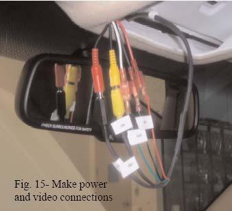 ROUTE THE END OF THE CAMERA EXTENSION HARNESS MARKED TO MIRROR WITH THE MALE CONNECTORS UP THE CENTER OF THE WINDSHIELD AND BEHIND HEADLINER TO THE CONSOLE OPENING. FIGURE 5.