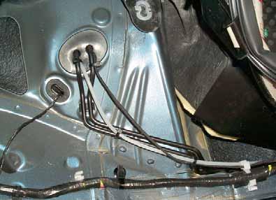 Route fuel line and wiring harness of metering pump along original vehicle lines in passenger compartment.