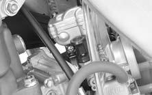 Loosen the insulator band screw. 5. Loosen the screws (5) and remove the carburetor top (6).