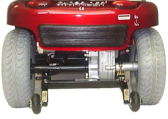 DRIVE/FREEWHEEL OPERATION (FIG 3) The drive/freewheel lever is located next to the right rear wheel, under rear bumper.