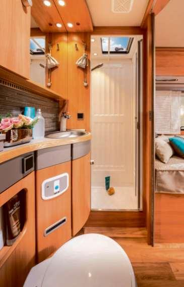 The bathroom in the HYMER Nova 540 GL boasts an array of open and closed shelving and cupboards for secure storage of all your